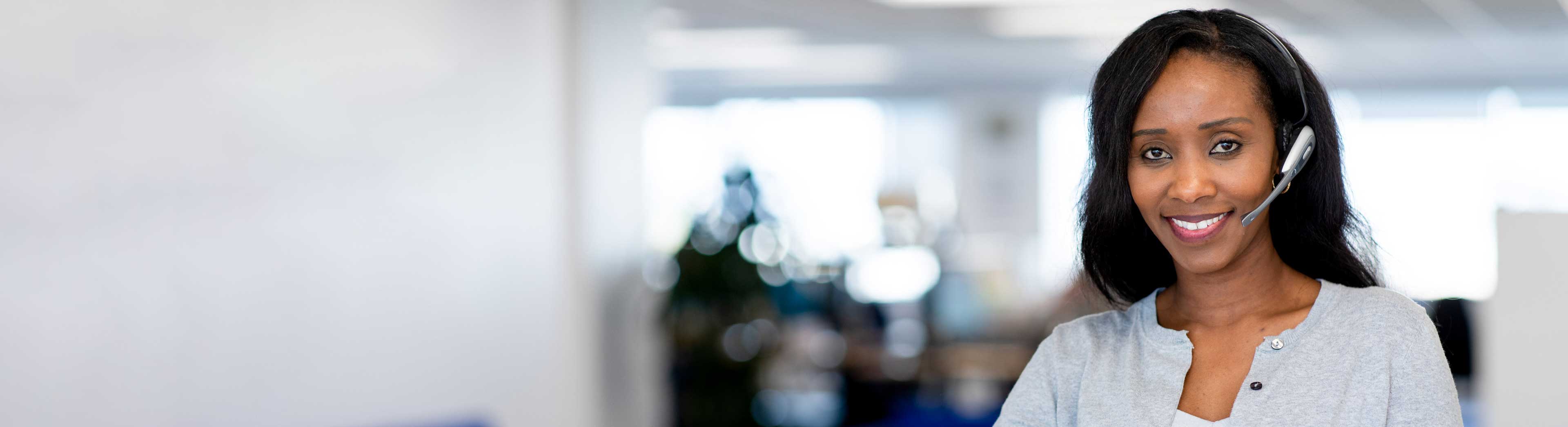 Female customer service representative with a headset